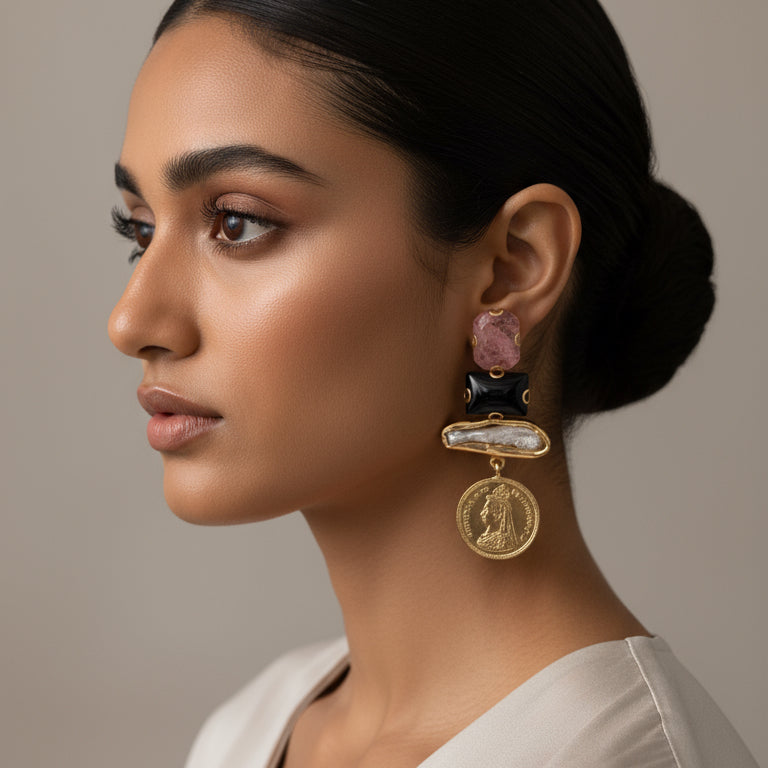 Pair of earrings with gold coins and pink stones