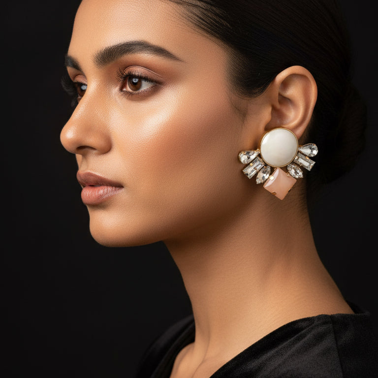 Pair of ornate peach earrings