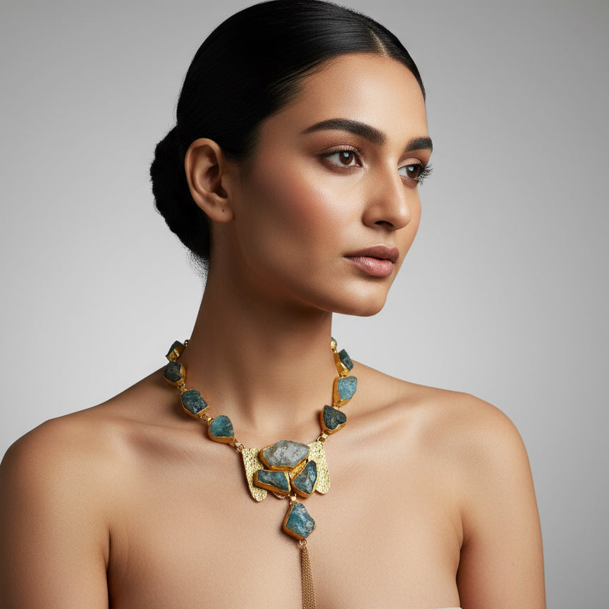 brass and blue necklace 