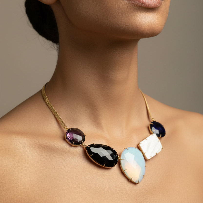 Woman wearing a necklace with multicolored stones on a neutral background