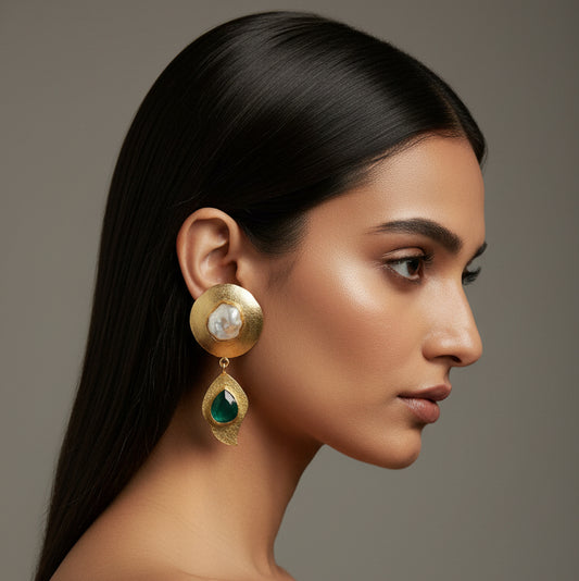 Gold earrings with green stones 