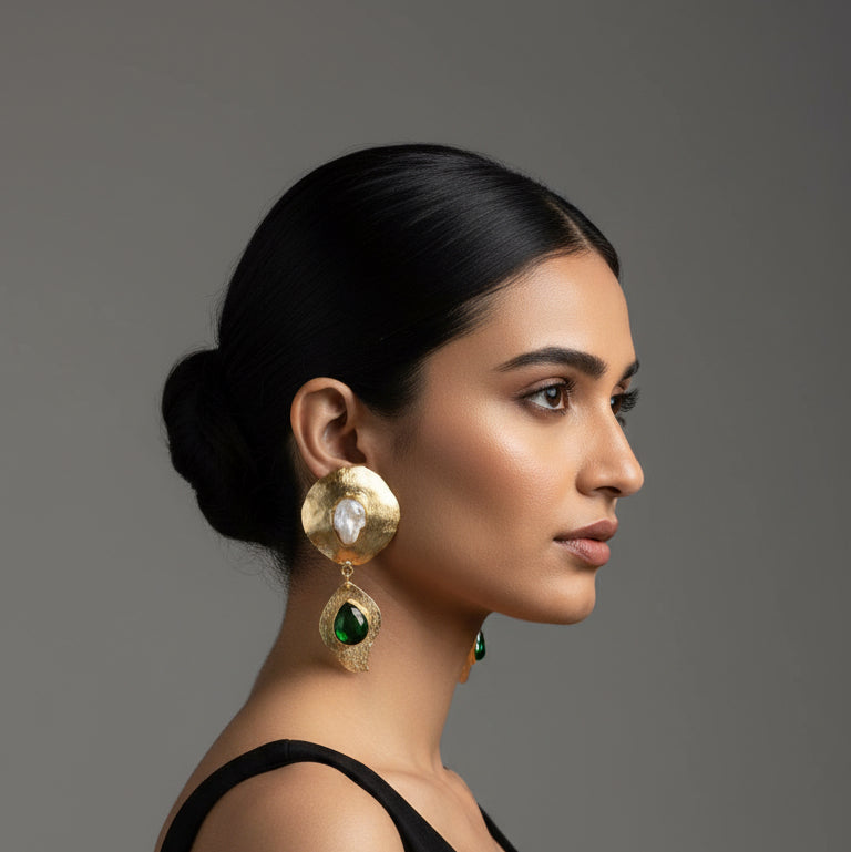 Gold earrings with green gemstones 