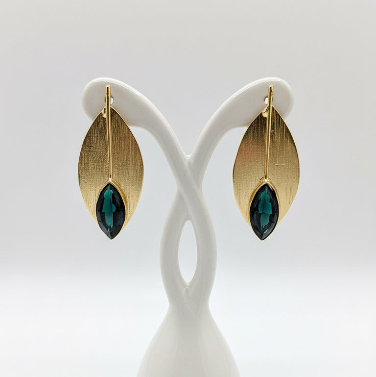 Gold leaf-shaped earrings with green leaf centre