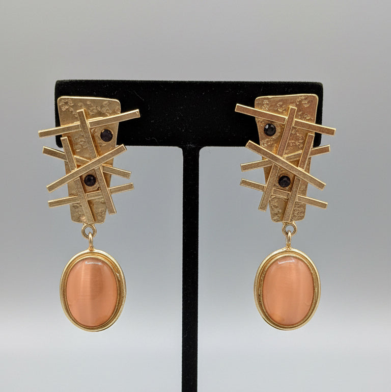 Pair of gold and rose gold earrings 