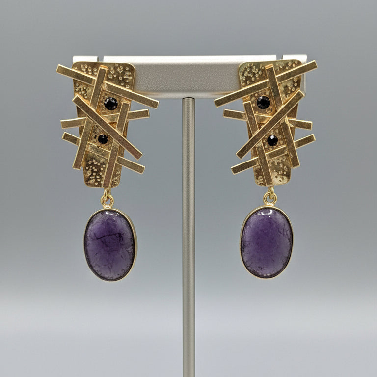 Pair of gold and purple earrings 