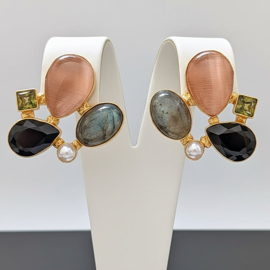 Pair of gold earrings with gemstones 